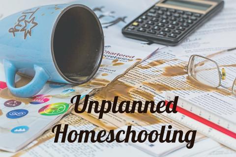 Unplanned Homeschooling written over picture of coffee spilled on papers